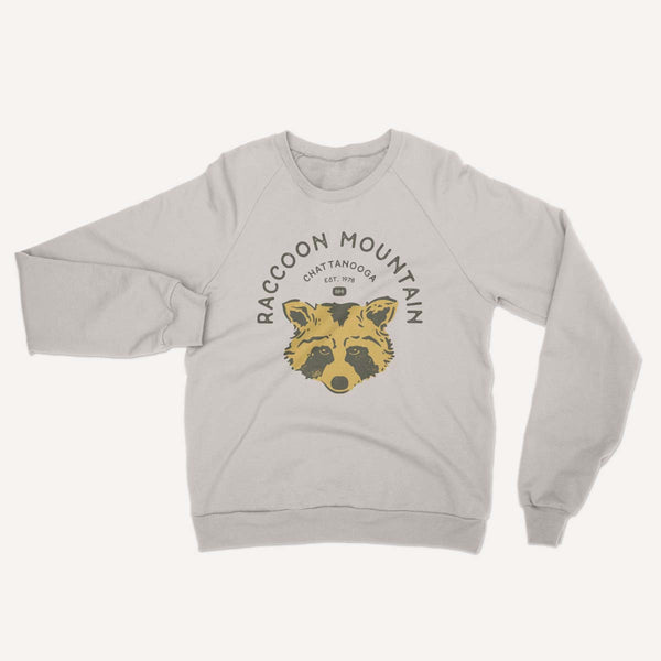 A Bella Canvas heather dust crewneck featuring our NativeMade Raccoon Mountain Chattanooga design.