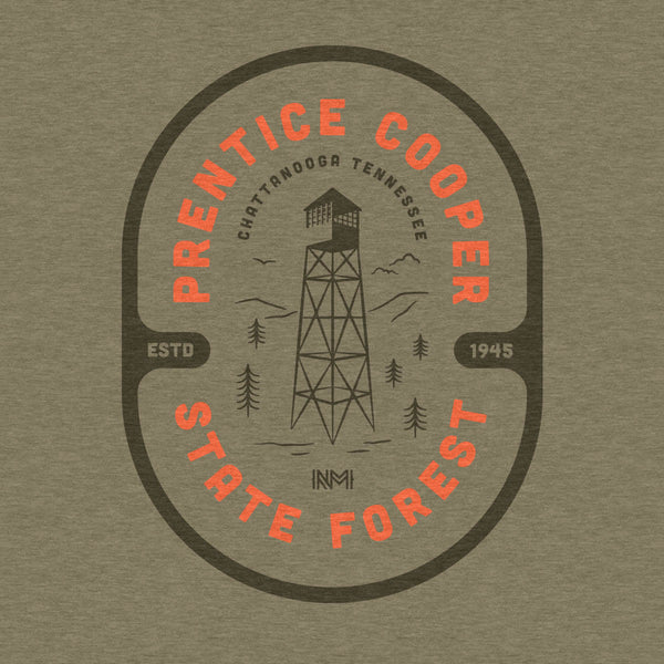NativeMade Prentice Cooper State Forest Badge design featuring mountains, trees, and a watch tower.