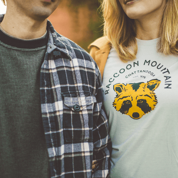 A Bella Canvas heather dust t-shirt featuring our NativeMade Raccoon Mountain Chattanooga design.