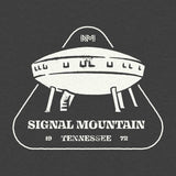Closeup of the NativeMade Signal Mountain Spaceship House design on a Heather Black youth tee