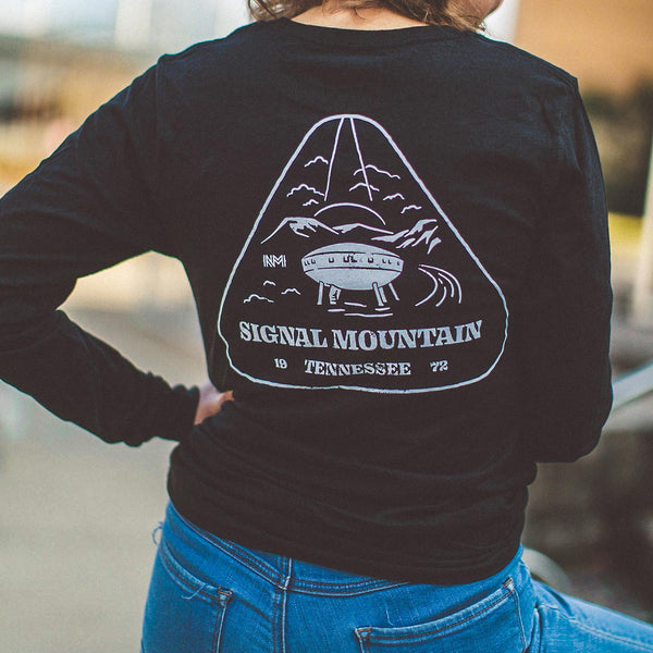 Model wearing our NativeMade Signal Mountain Spaceship House long sleeve in heather black