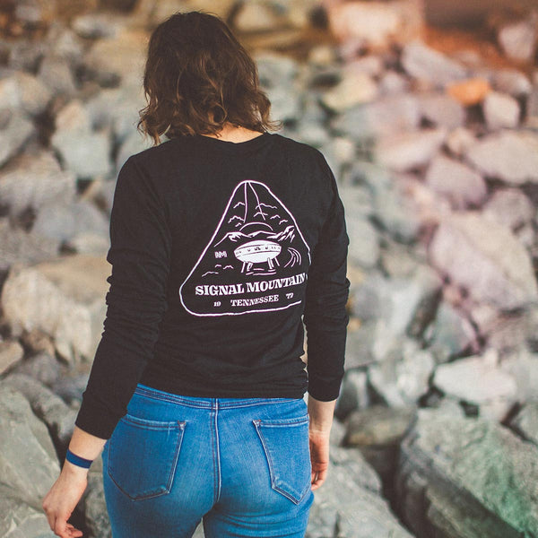 Model wearing our NativeMade Signal Mountain Spaceship House long sleeve in heather black in Chattanooga, TN